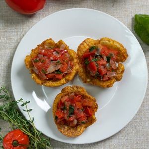 Fried Plantain fill with tomato sauce